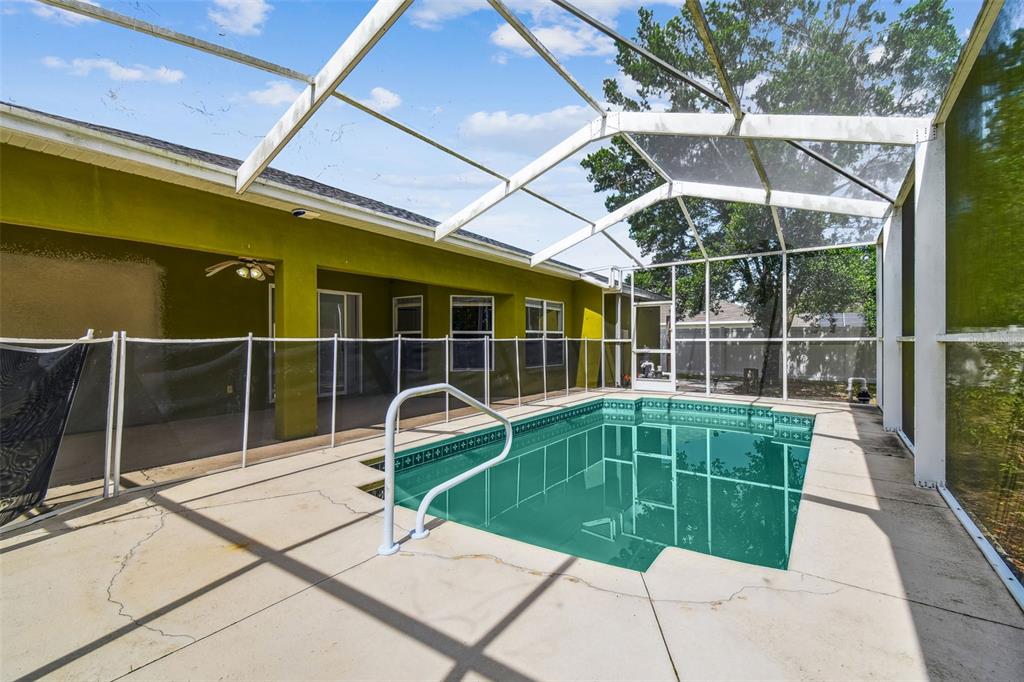 2222 Champlain Avenue Spring Hill, FL 34609 - Photo 48 of 74 a view of a chairs and table