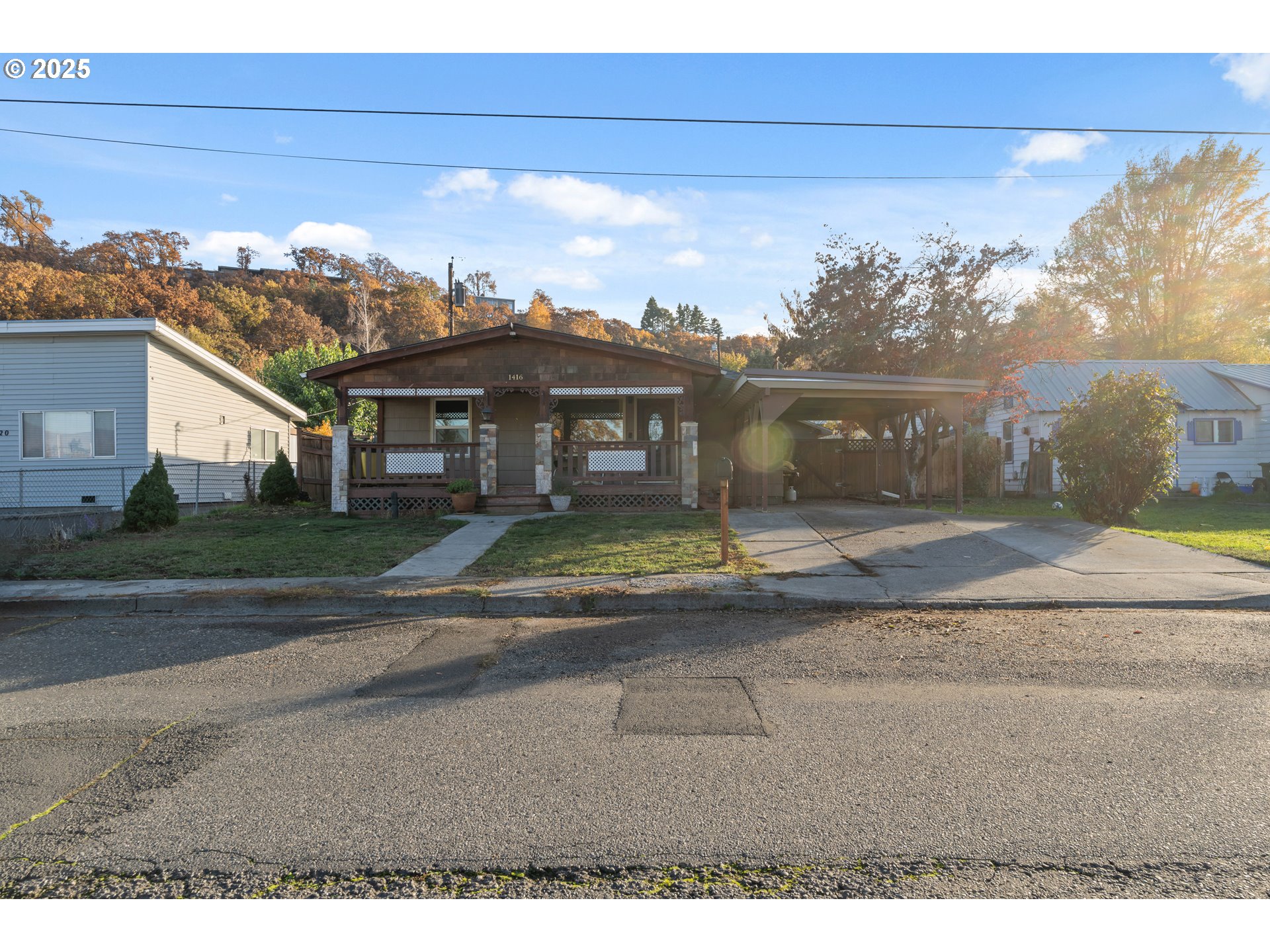 1416 East 14th Street The Dalles, OR 97058 - Photo 1 of 27 a view of a house with a yard