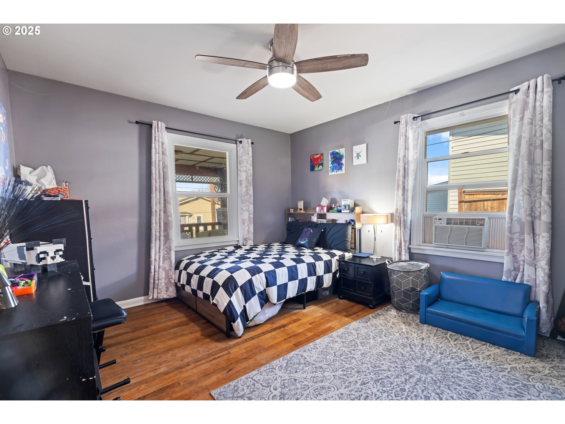 1416 East 14th Street The Dalles, OR 97058 - Photo 21 of 27 a bedroom with a bed and window