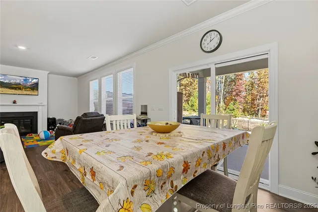 a bedroom with a bed and a tv on table