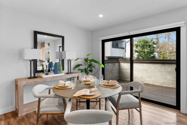 a view of a dining room with furniture window and outside view