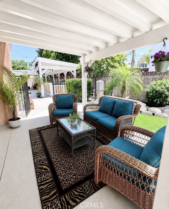 21104 Rosedell Drive Saugus, CA 91350 - Photo 14 of 33 Gated covered patio retreat surrounded by peaceful garden and outdoor entertaining areas