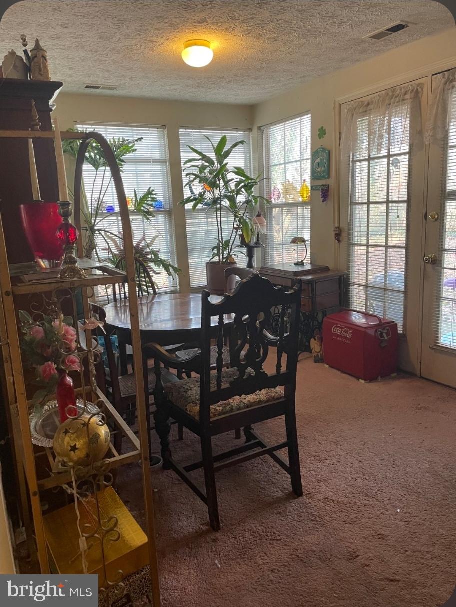 1302 Clover Valley Way, Unit 1302C Edgewood, MD 21040 - Photo 12 of 25 a view of a livingroom and dining room