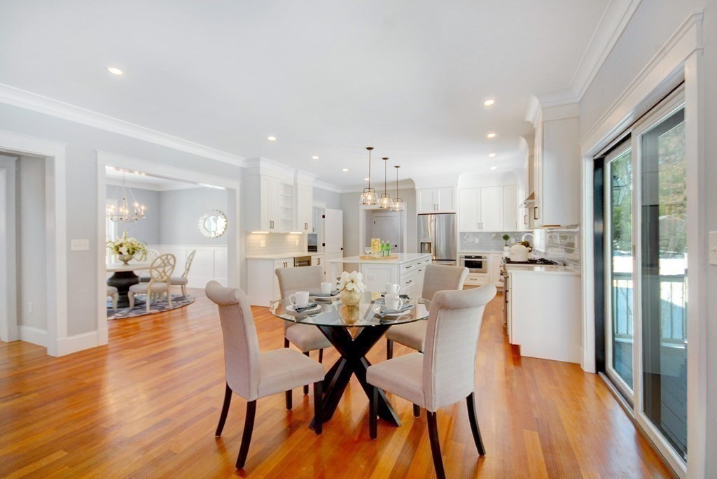 62 Pope Road Acton, MA 01720 - Photo 11 of 39 a view of a dining room with furniture and wooden floor