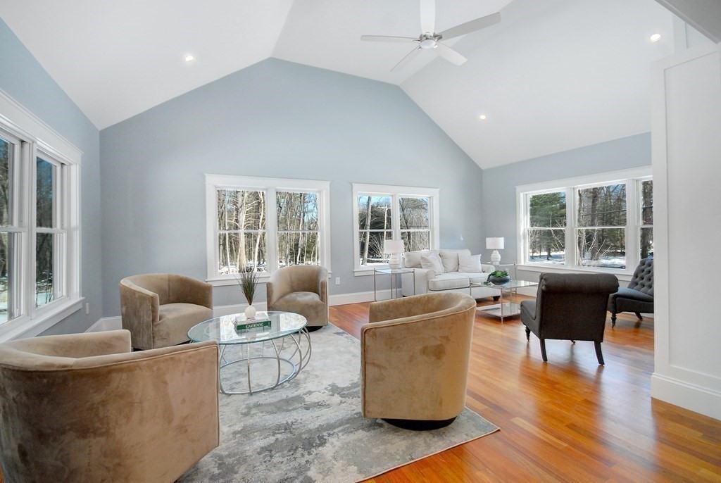 62 Pope Road Acton, MA 01720 - Photo 14 of 39 a living room with furniture and floor to ceiling windows