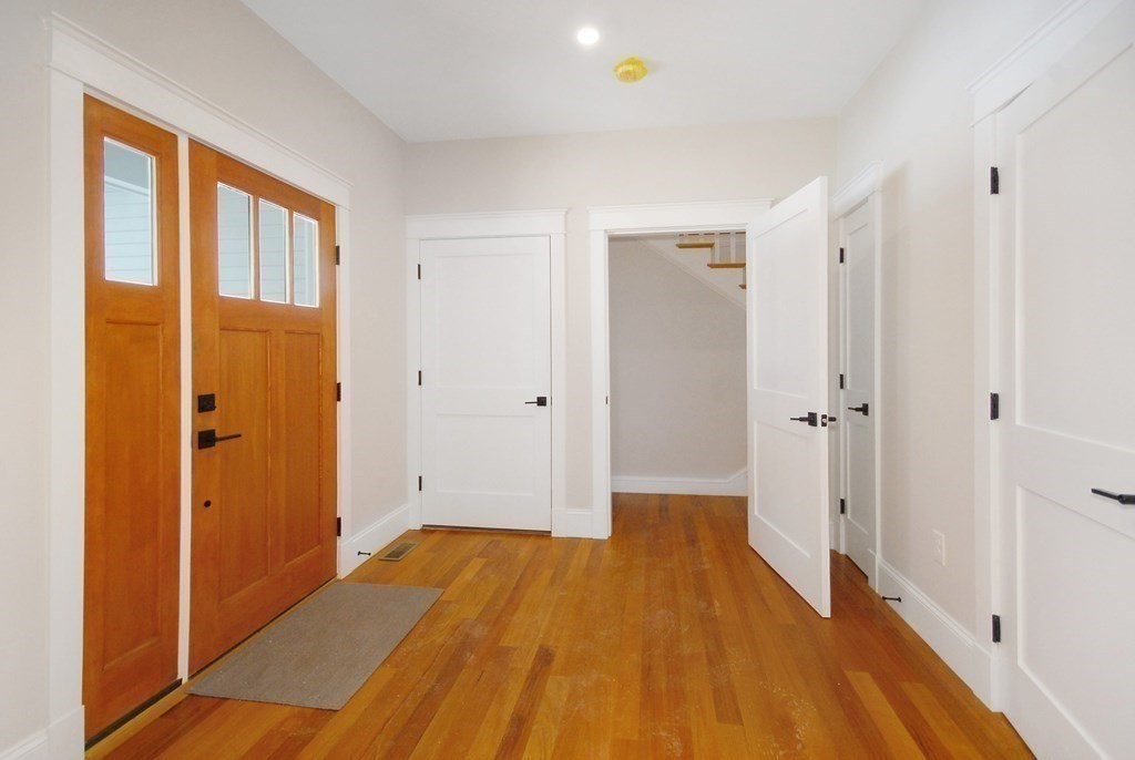 62 Pope Road Acton, MA 01720 - Photo 16 of 39 a view of a room with wooden floor and a window