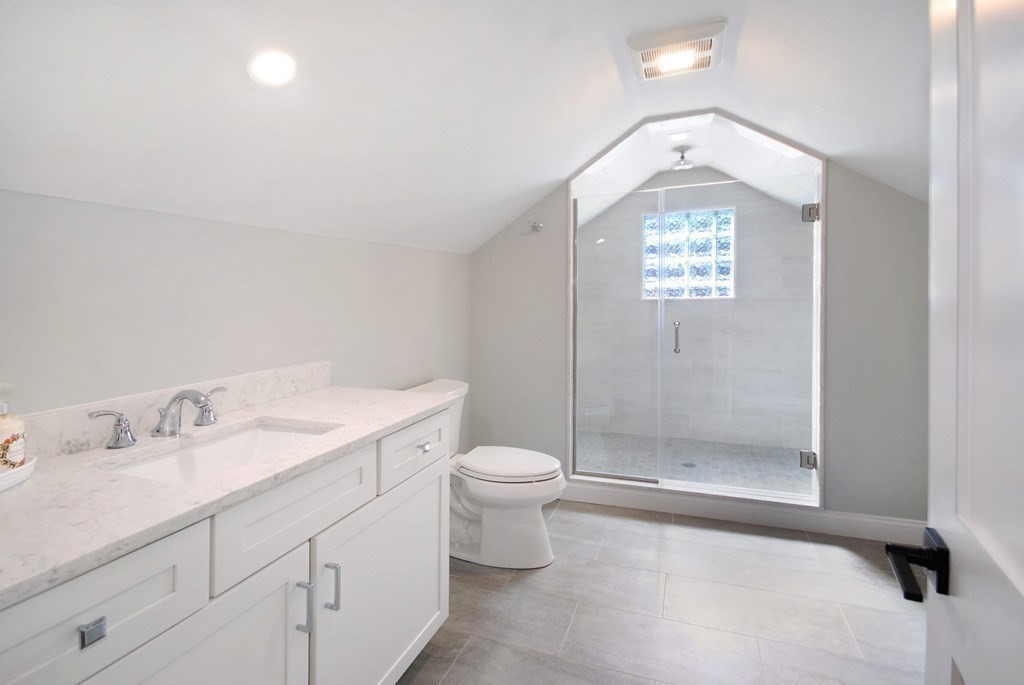 62 Pope Road Acton, MA 01720 - Photo 21 of 39 a bathroom with a sink a toilet and shower