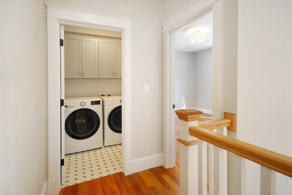 62 Pope Road Acton, MA 01720 - Photo 23 of 39 a view of a bedroom with washer and dryer