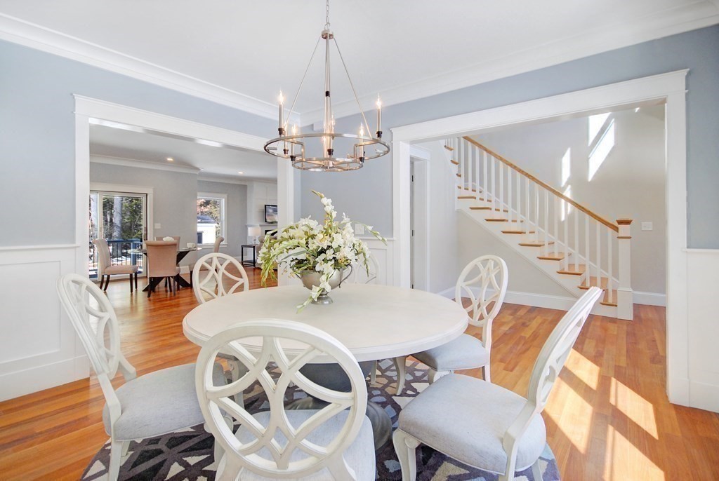 62 Pope Road Acton, MA 01720 - Photo 5 of 39 a view of a dining room with furniture and wooden floor