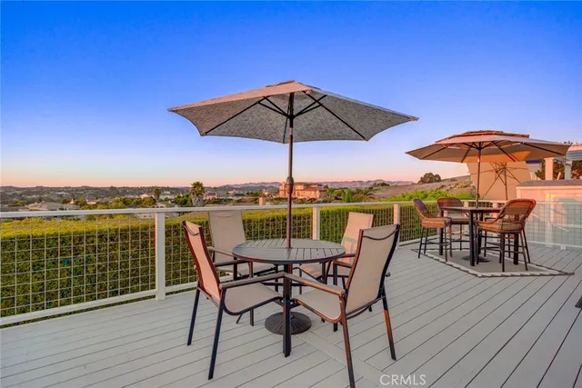 a view of a terrace with sitting area