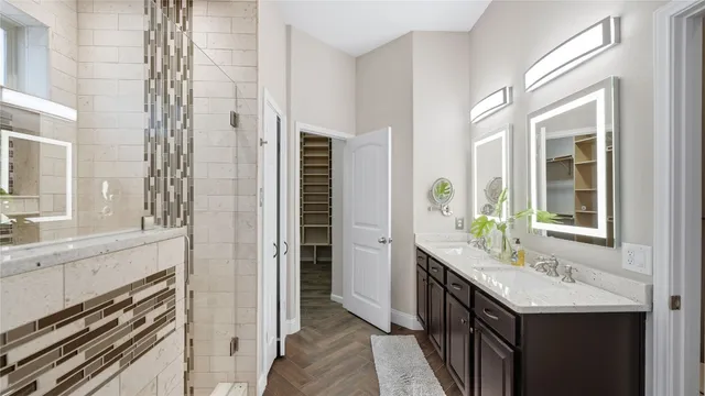 a bathroom with a sink and a shower