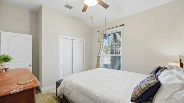 a bathroom with a sink vanity granite toilet and shower