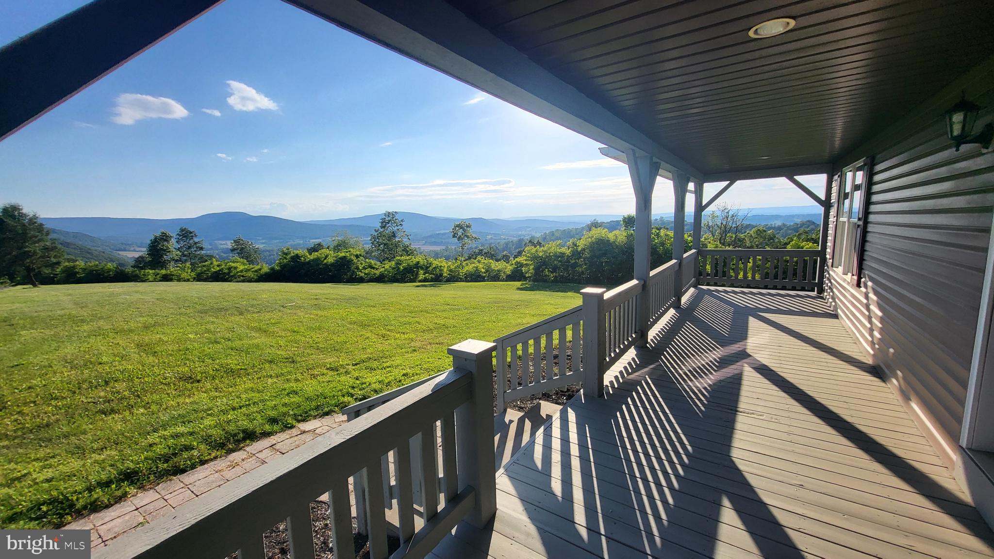 200 Pisgah Rest Shermans Dale, PA 17090 - Photo 6 of 23 a view of a balcony with wooden floor and a garden