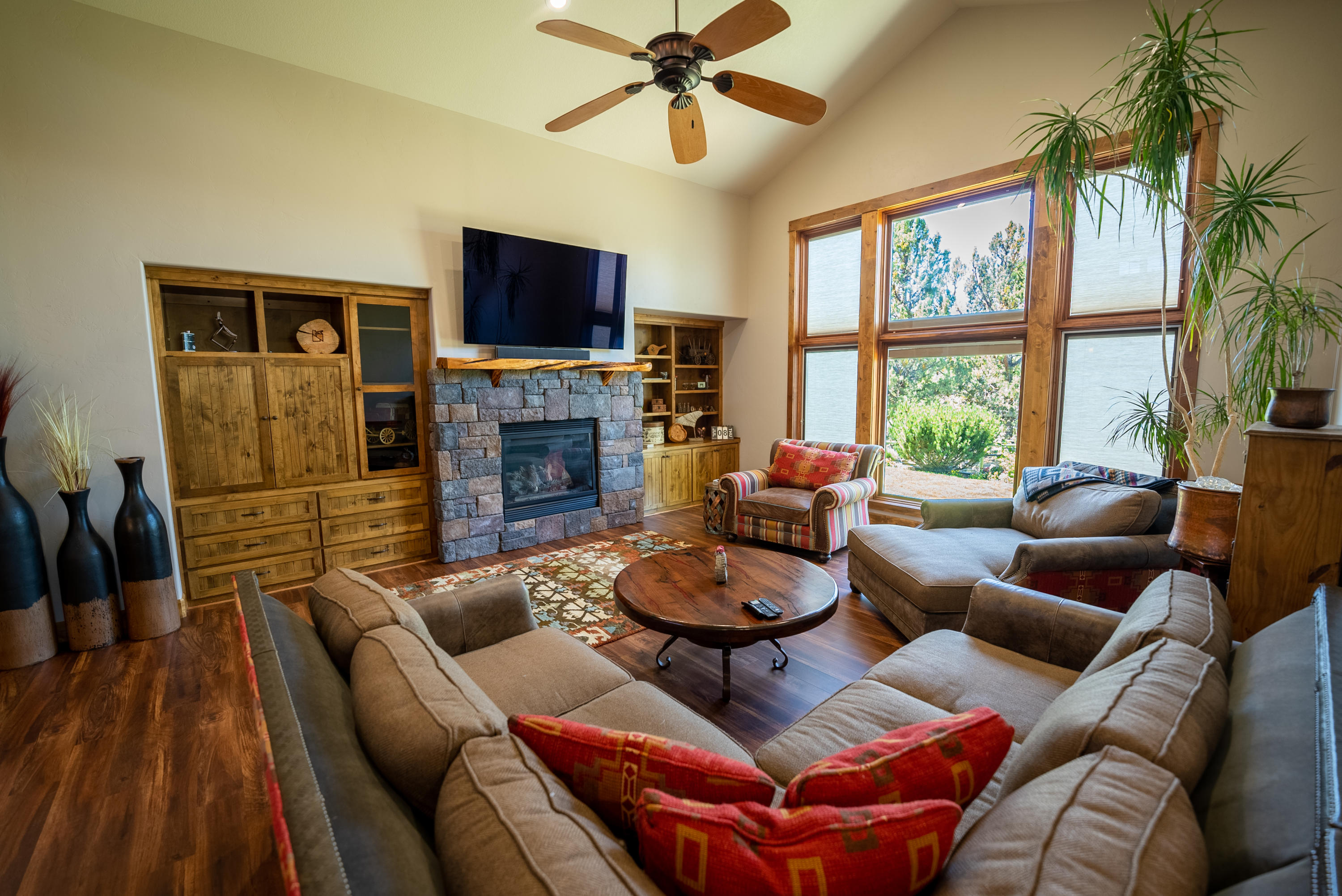 63545 Overtree Road Bend, OR 97701 - Photo 6 of 63 Pella windows with built in blinds bring in daylight and canal views