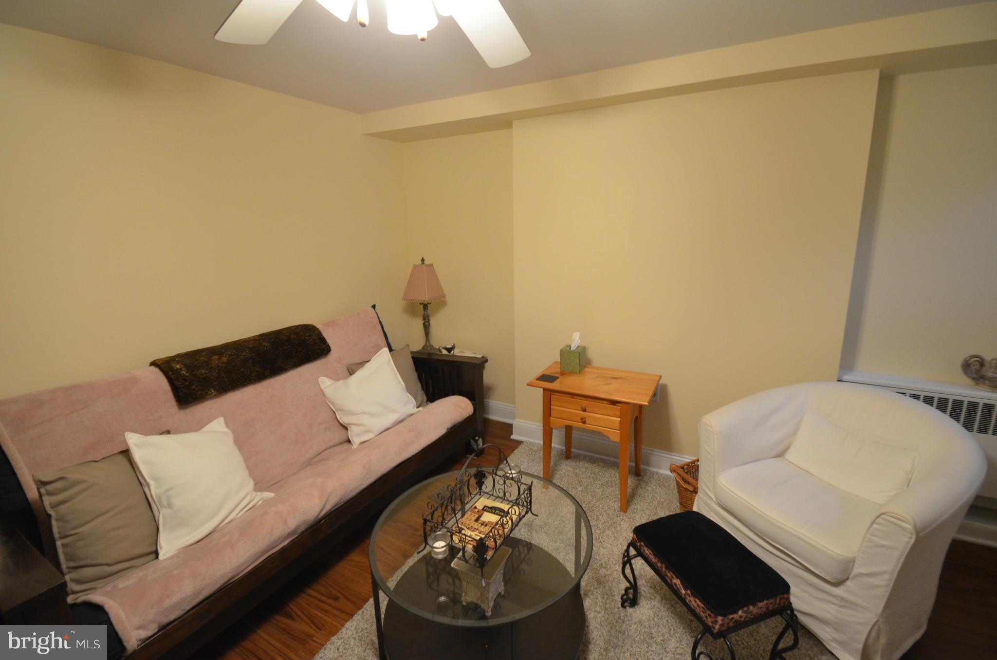 2309 Eastern Avenue Baltimore, MD 21224 - Photo 20 of 30 a living room with furniture and a couch
