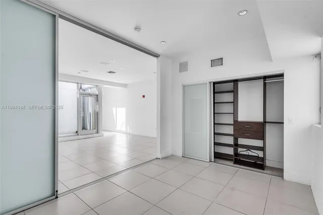 a view of a room with shelves