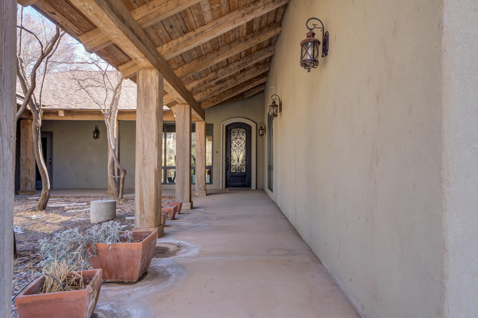 a view of a hallway with seating area