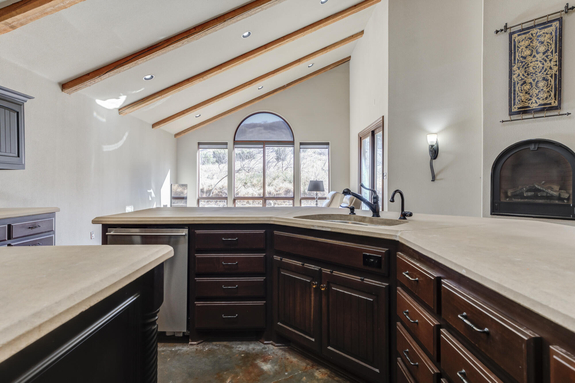41 South Lake Shore Drive Ransom Canyon, TX 79366 - Photo 15 of 56 a kitchen with a sink and a large window