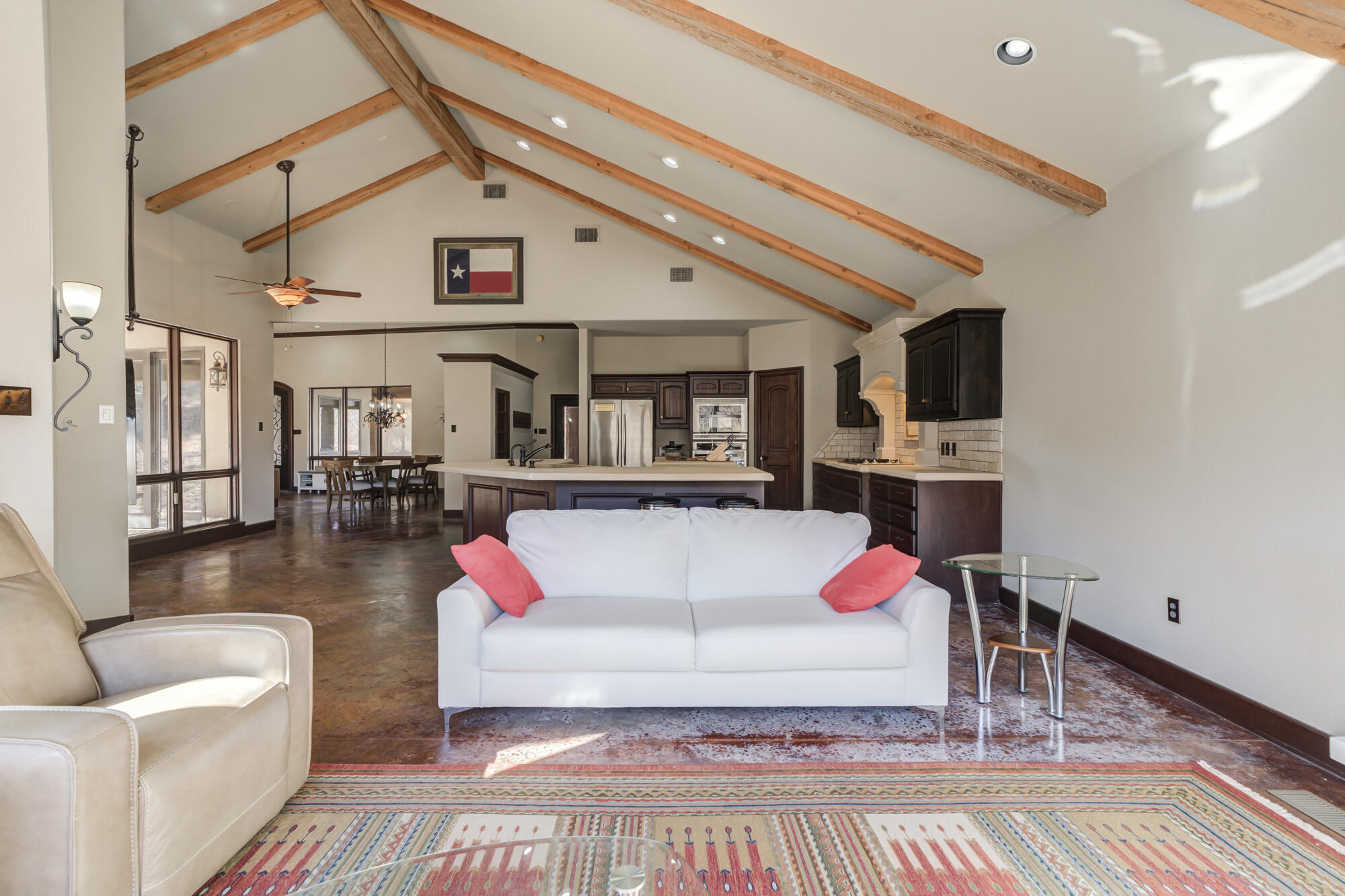 41 South Lake Shore Drive Ransom Canyon, TX 79366 - Photo 19 of 56 a living room with furniture fireplace and flat screen tv