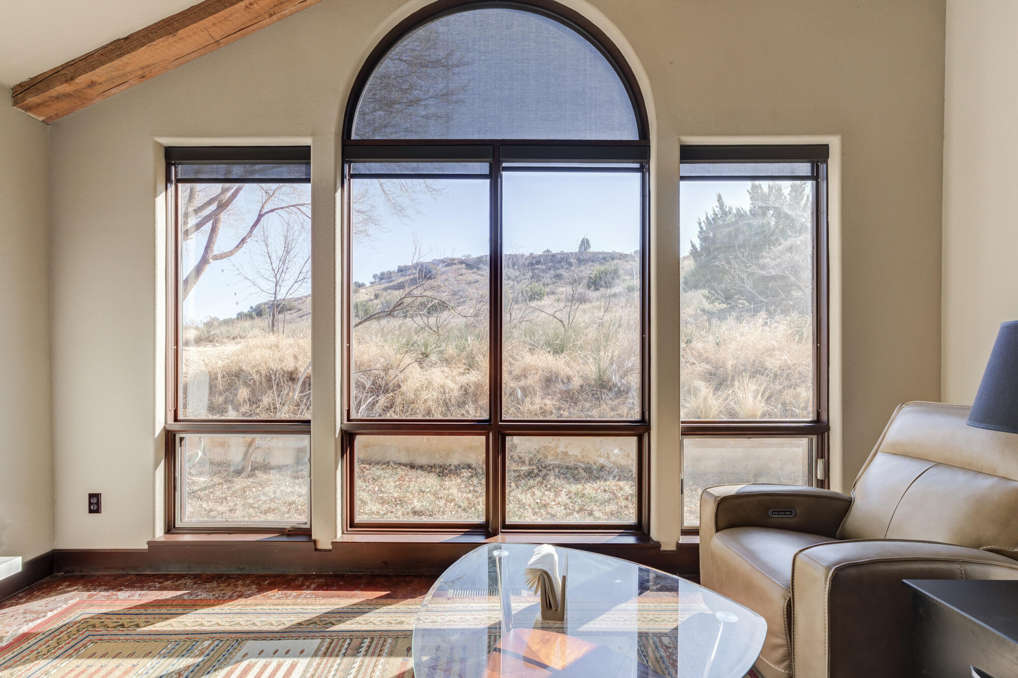 41 South Lake Shore Drive Ransom Canyon, TX 79366 - Photo 23 of 56 a living room with a large window and a wooden floor