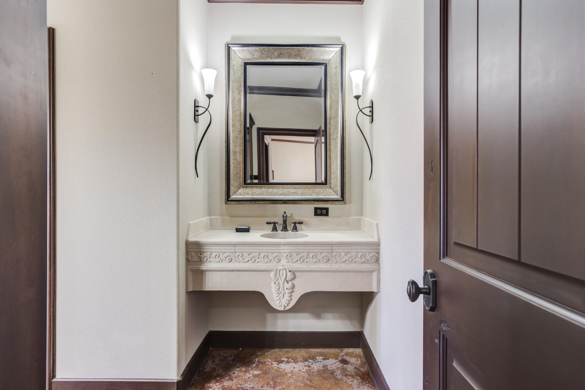 41 South Lake Shore Drive Ransom Canyon, TX 79366 - Photo 29 of 56 a bathroom with a sink and a mirror
