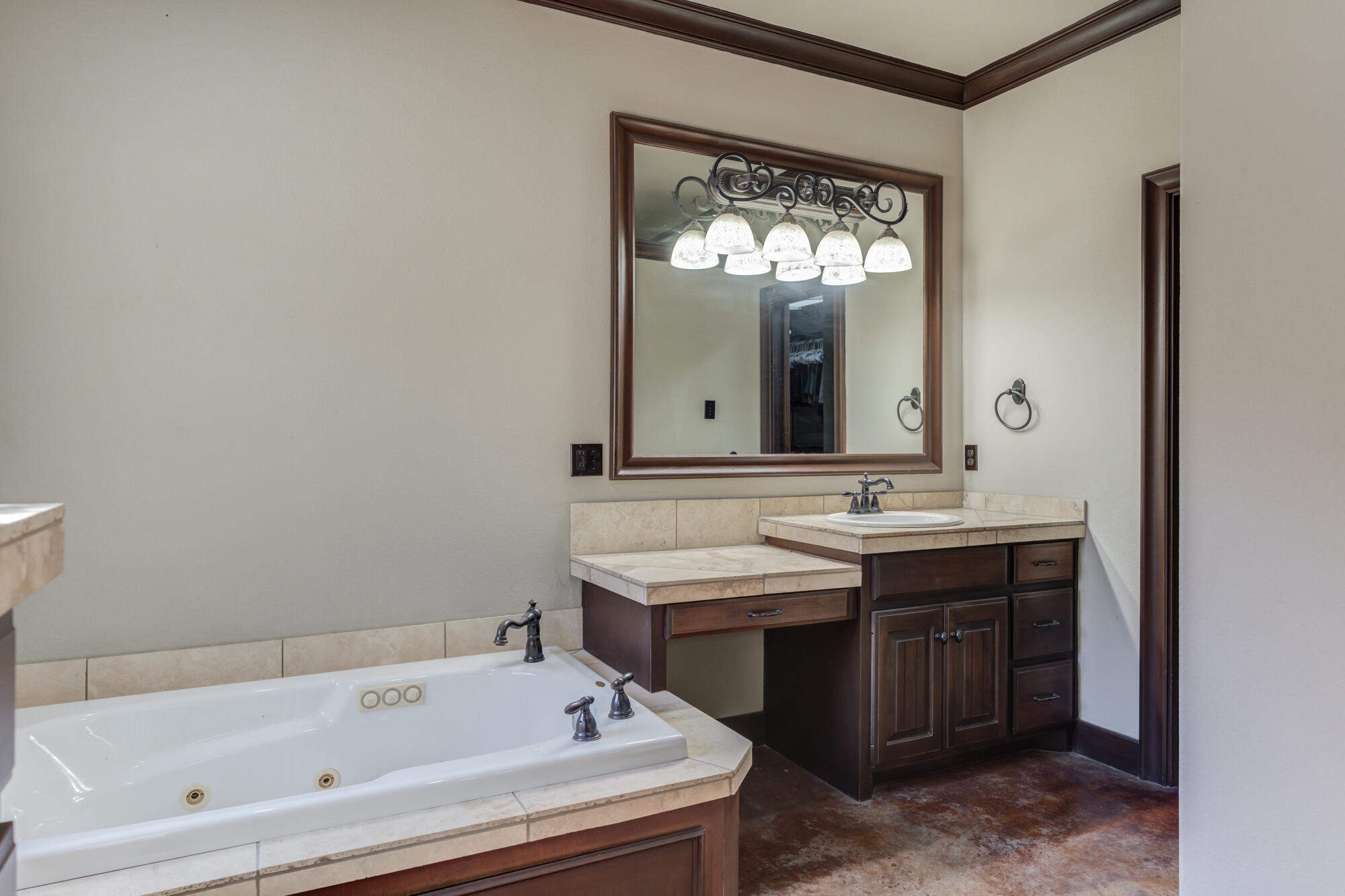 41 South Lake Shore Drive Ransom Canyon, TX 79366 - Photo 38 of 56 a bathroom with a tub and a sink