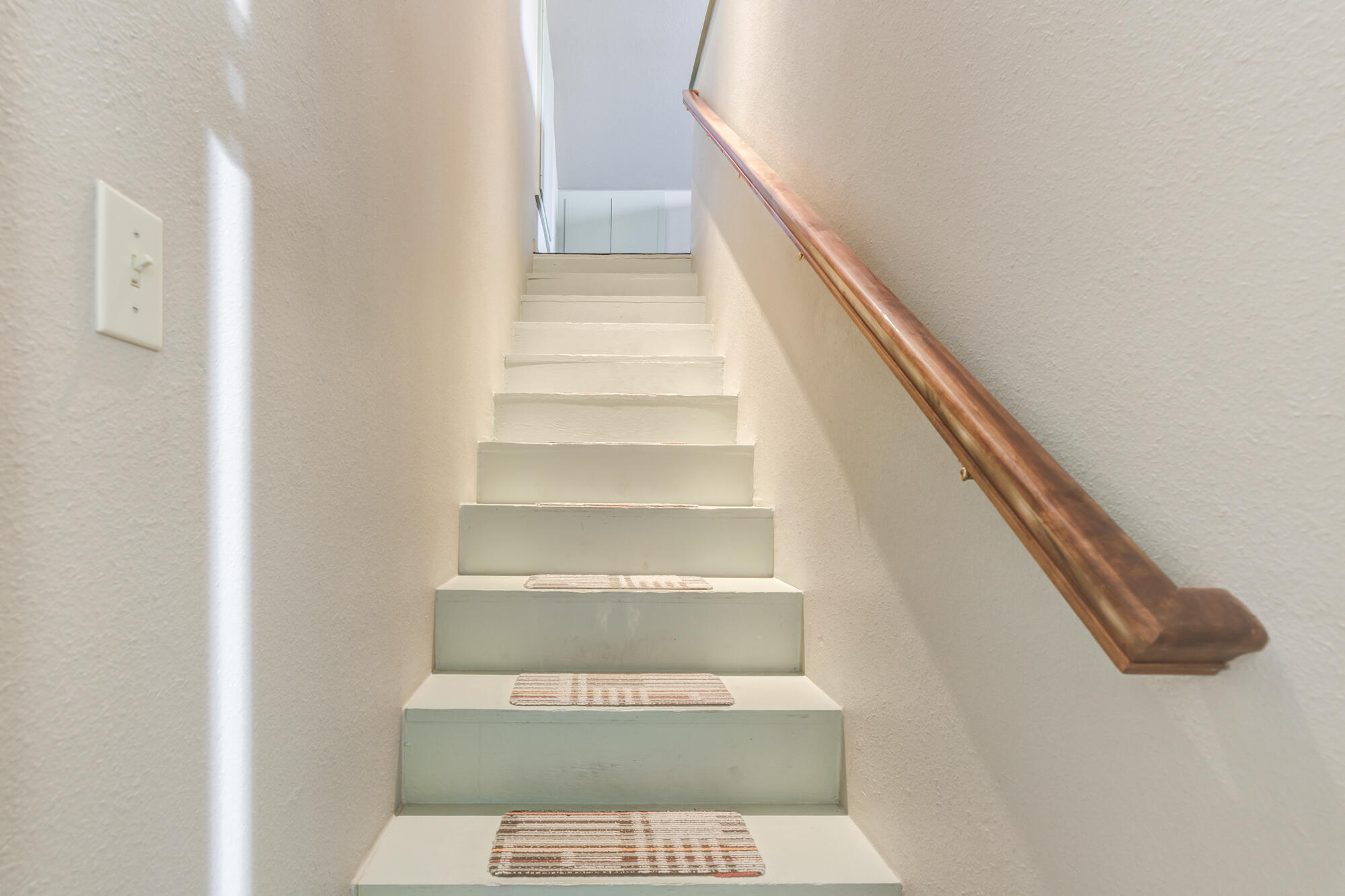 41 South Lake Shore Drive Ransom Canyon, TX 79366 - Photo 44 of 56 a view of staircase with white walls and a window