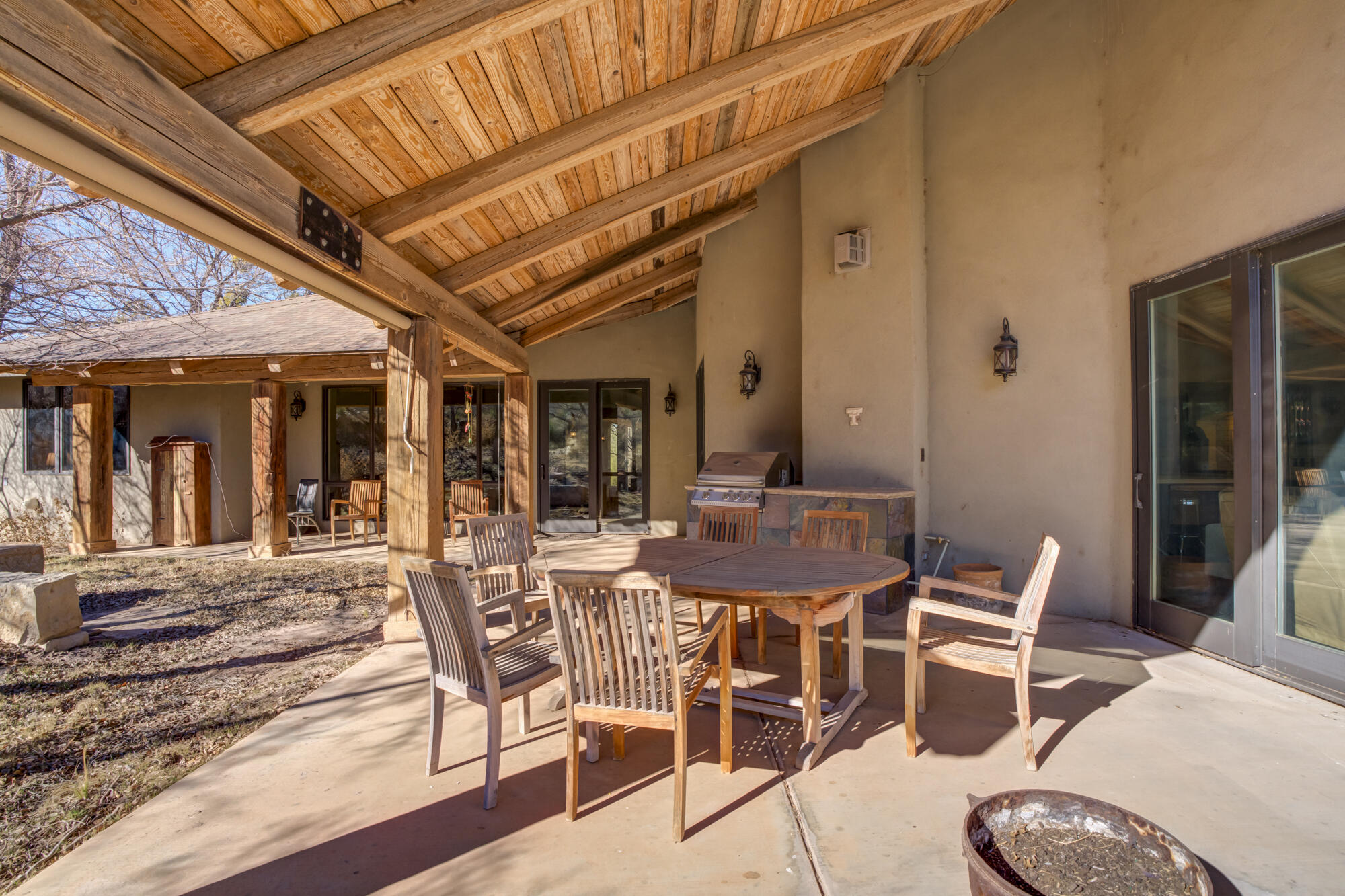 41 South Lake Shore Drive Ransom Canyon, TX 79366 - Photo 54 of 56 a view of a patio with table and chairs and potted plants