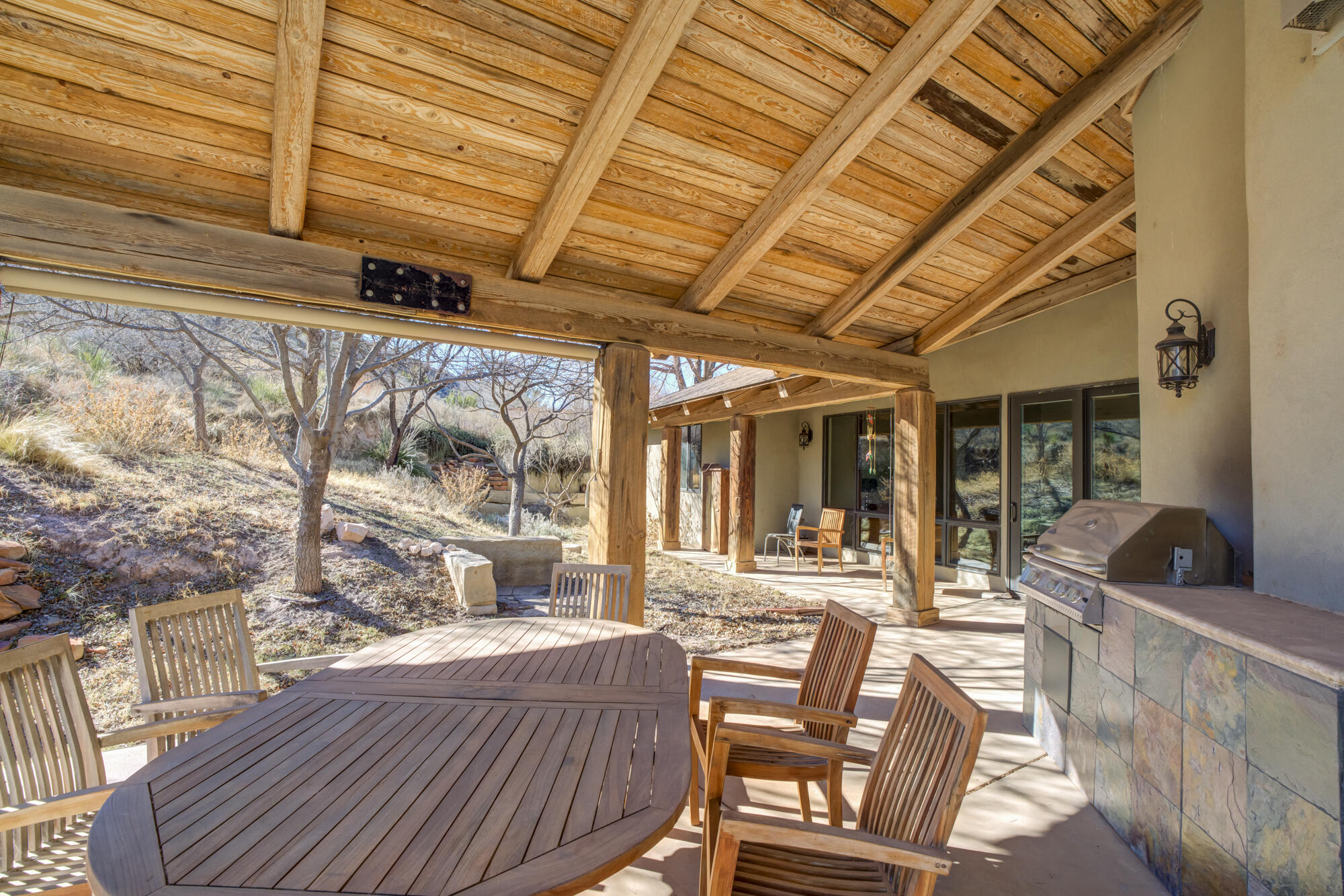 41 South Lake Shore Drive Ransom Canyon, TX 79366 - Photo 55 of 56 a view of a patio with table and chairs and wooden floor