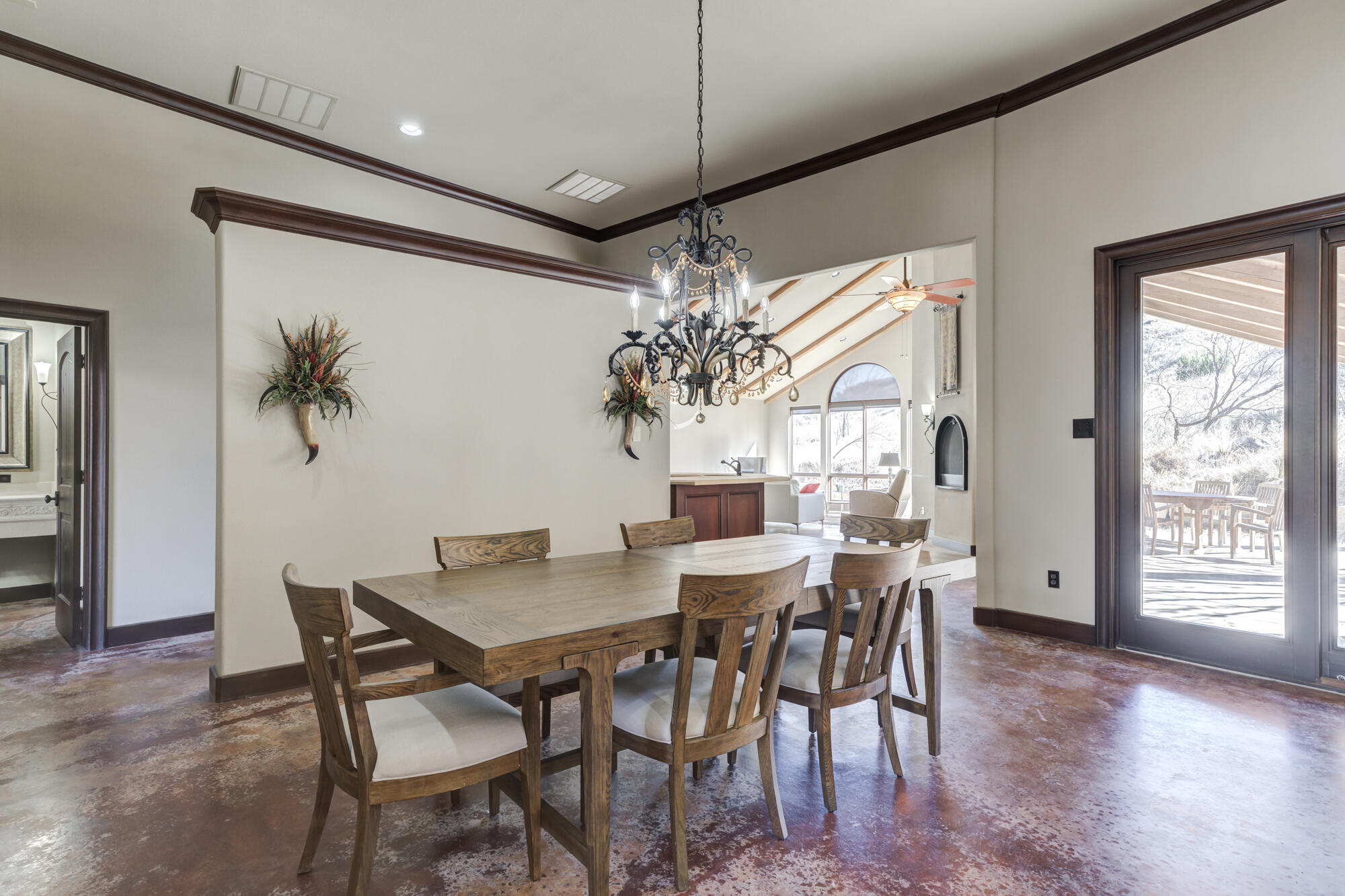 41 South Lake Shore Drive Ransom Canyon, TX 79366 - Photo 9 of 56 a view of a dining room with furniture and wooden floor