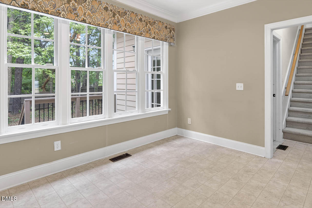 2209 Lodestar Drive Raleigh, NC 27615 - Photo 10 of 50 a view of an empty room with a window