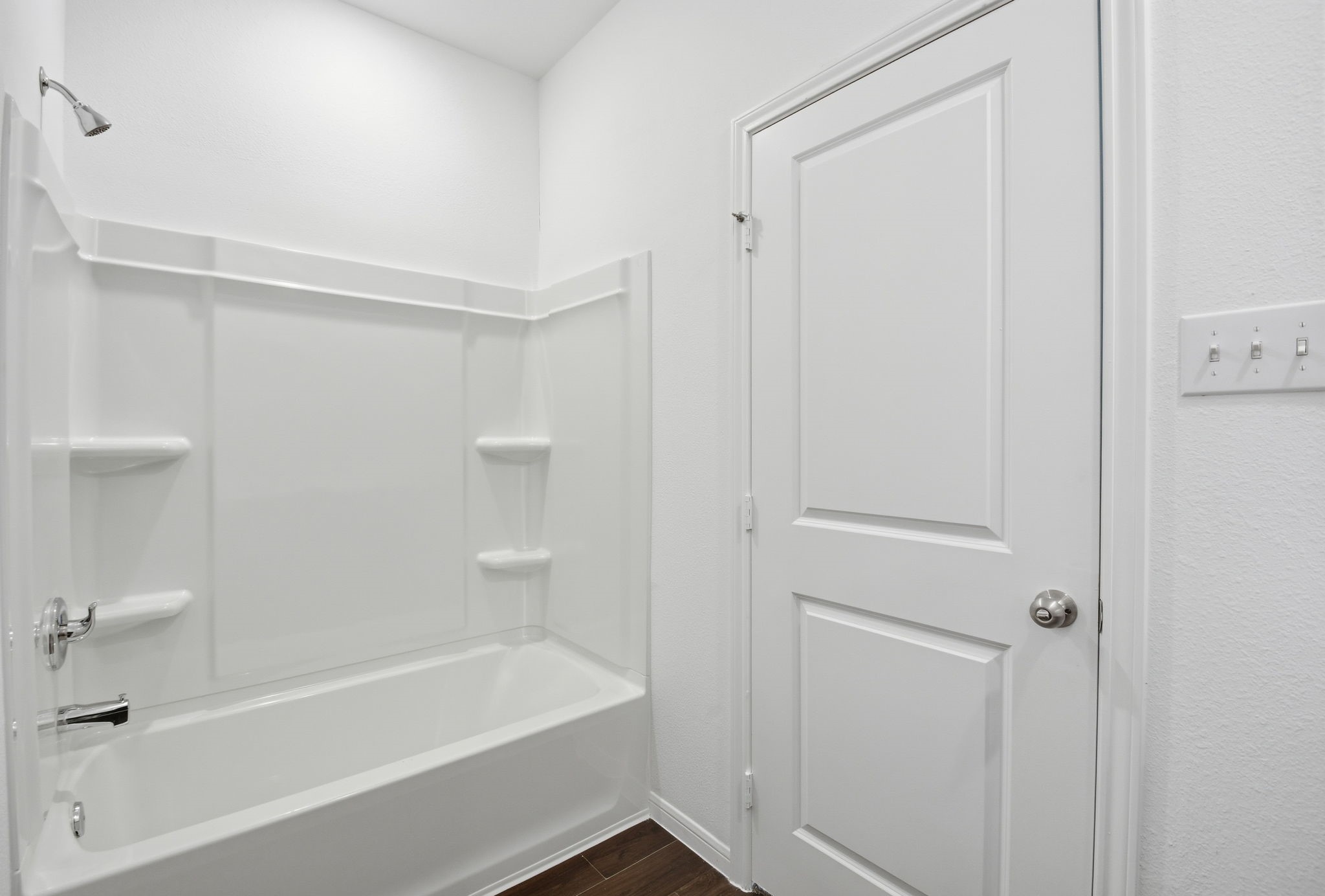 24721 Cherry Log Lane Porter, TX 77365 - Photo 23 of 36 a bathroom with a bathtub and a shower