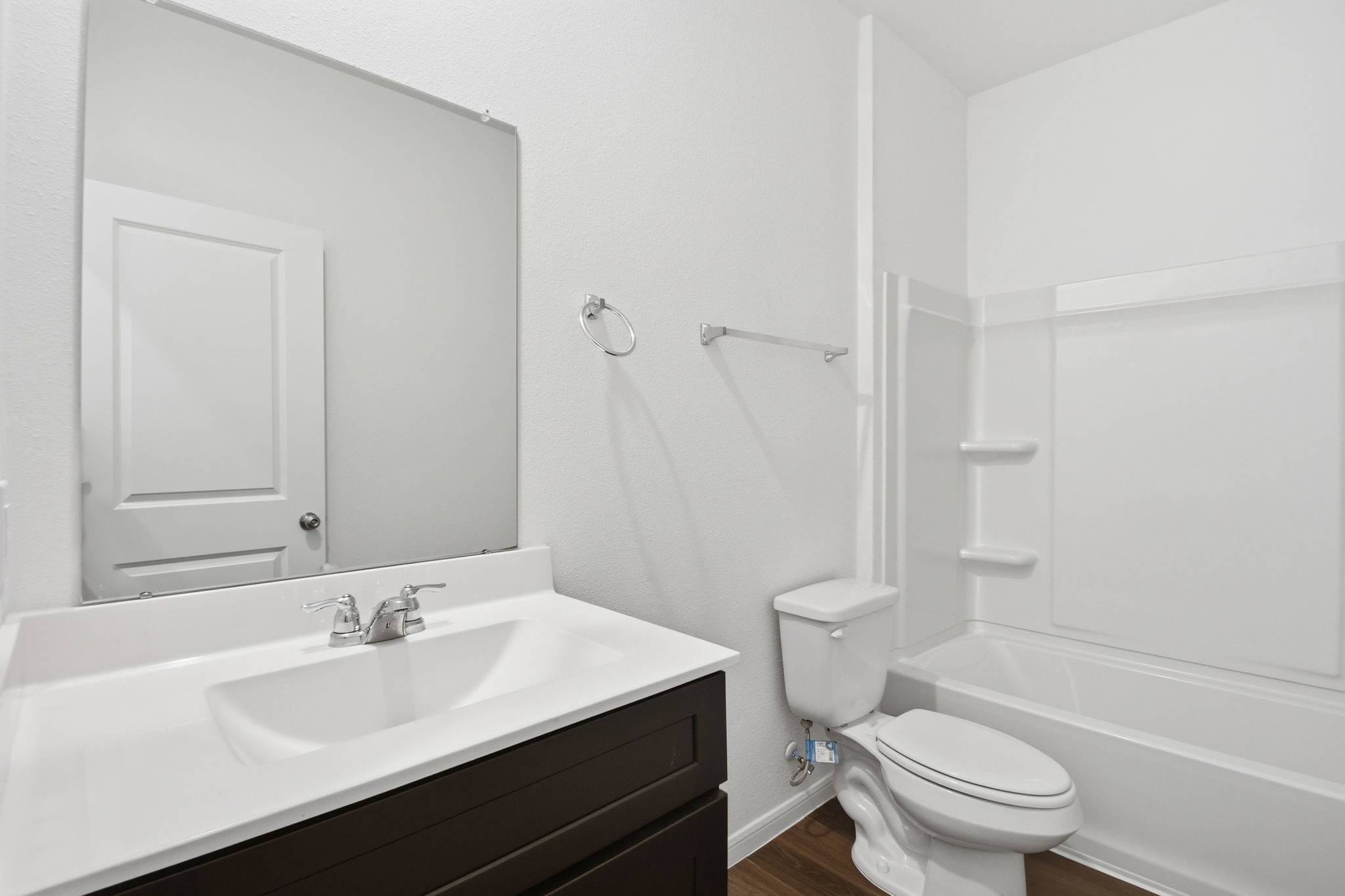 24721 Cherry Log Lane Porter, TX 77365 - Photo 28 of 36 a bathroom with a sink a toilet a shower and a mirror