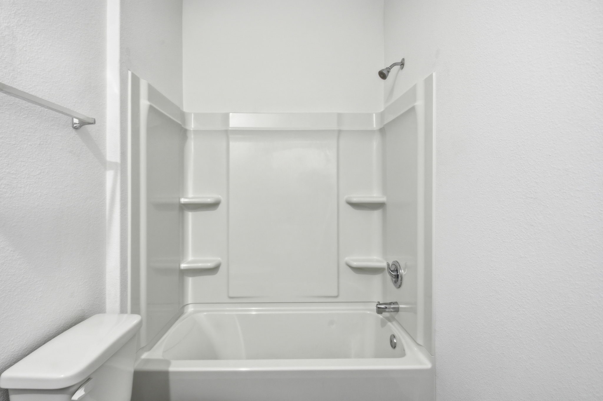 24721 Cherry Log Lane Porter, TX 77365 - Photo 29 of 36 a white bath tub sitting next to a toilet