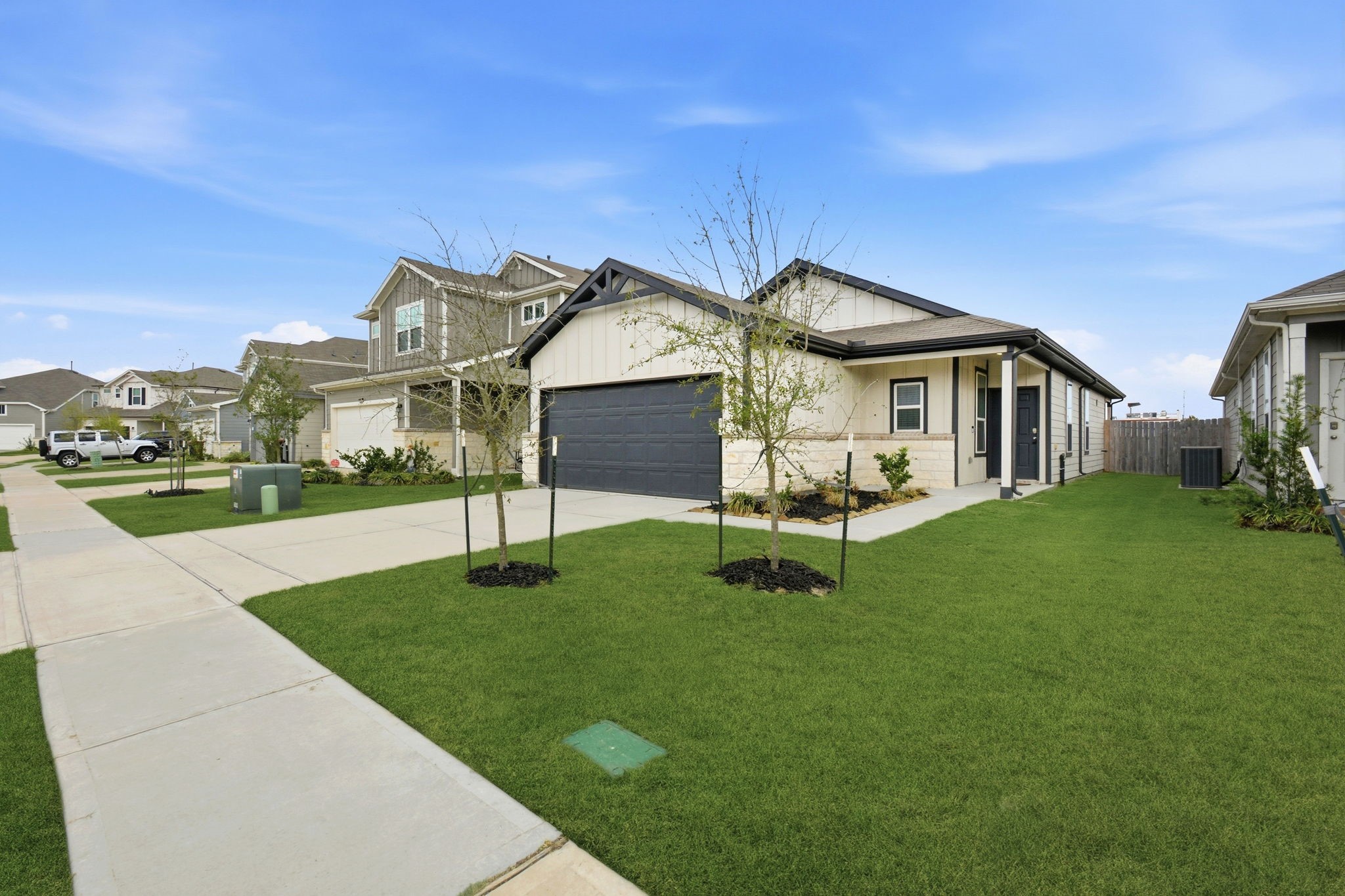 24721 Cherry Log Lane Porter, TX 77365 - Photo 5 of 36 a front view of a house with garden