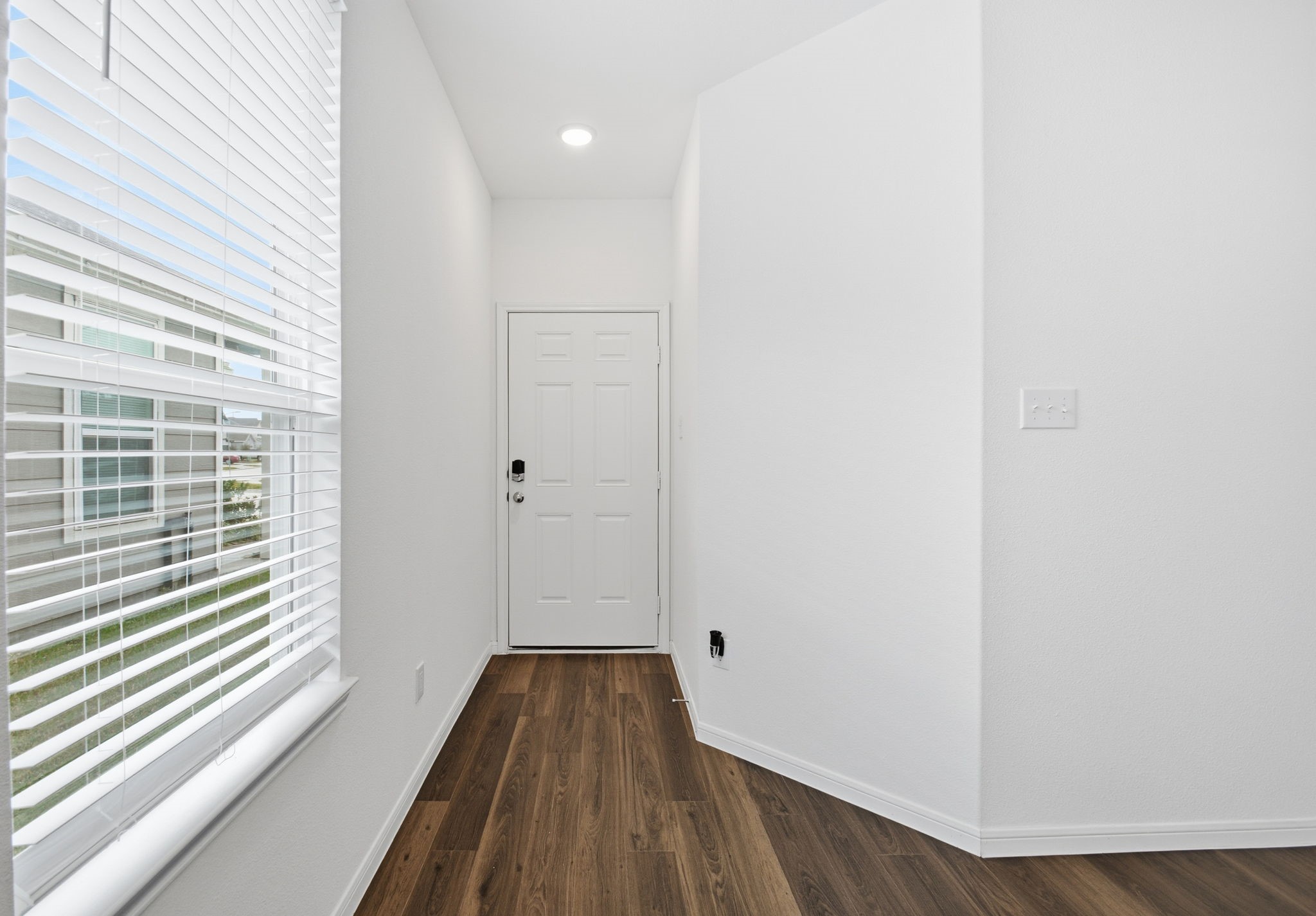 24721 Cherry Log Lane Porter, TX 77365 - Photo 7 of 36 a view of a room with wooden floor and a window