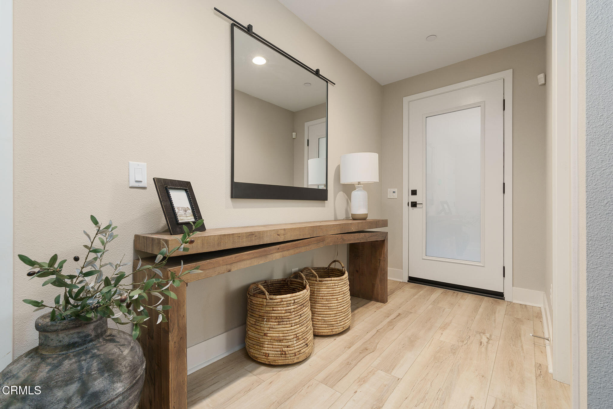 1066 Canal Street Oxnard, CA 93035 - Photo 12 of 34 a view of living room with furniture and wooden floor