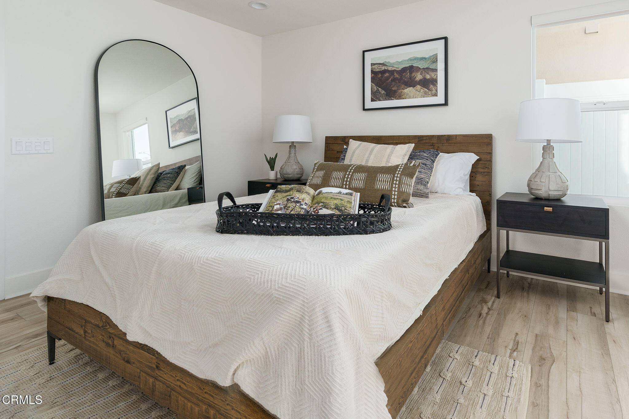 1066 Canal Street Oxnard, CA 93035 - Photo 14 of 34 a bedroom with bed and window