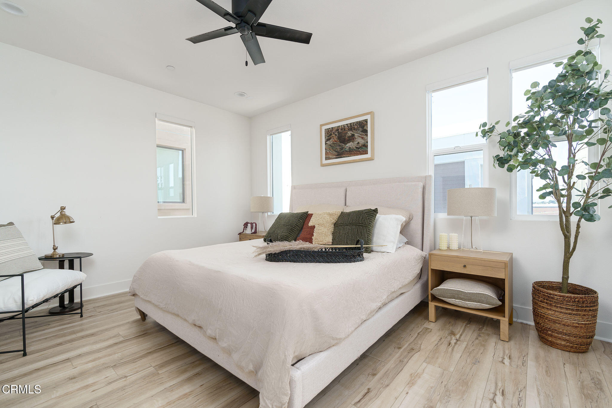 1066 Canal Street Oxnard, CA 93035 - Photo 15 of 34 a bedroom with a bed and window