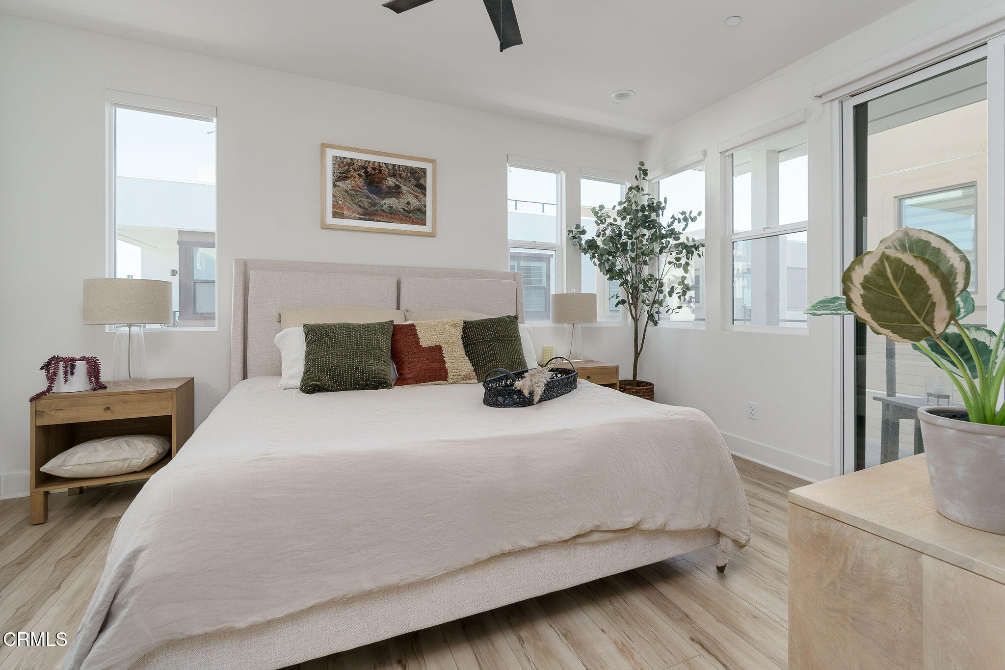 1066 Canal Street Oxnard, CA 93035 - Photo 16 of 34 a bedroom with a bed and window