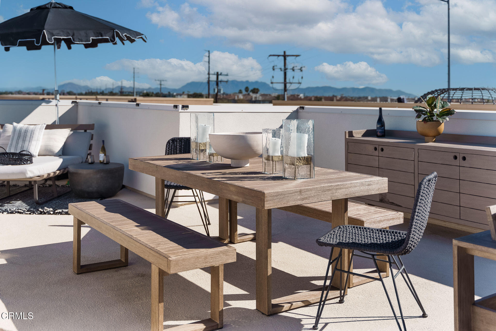 1066 Canal Street Oxnard, CA 93035 - Photo 25 of 34 a view of a terrace with furniture and stove