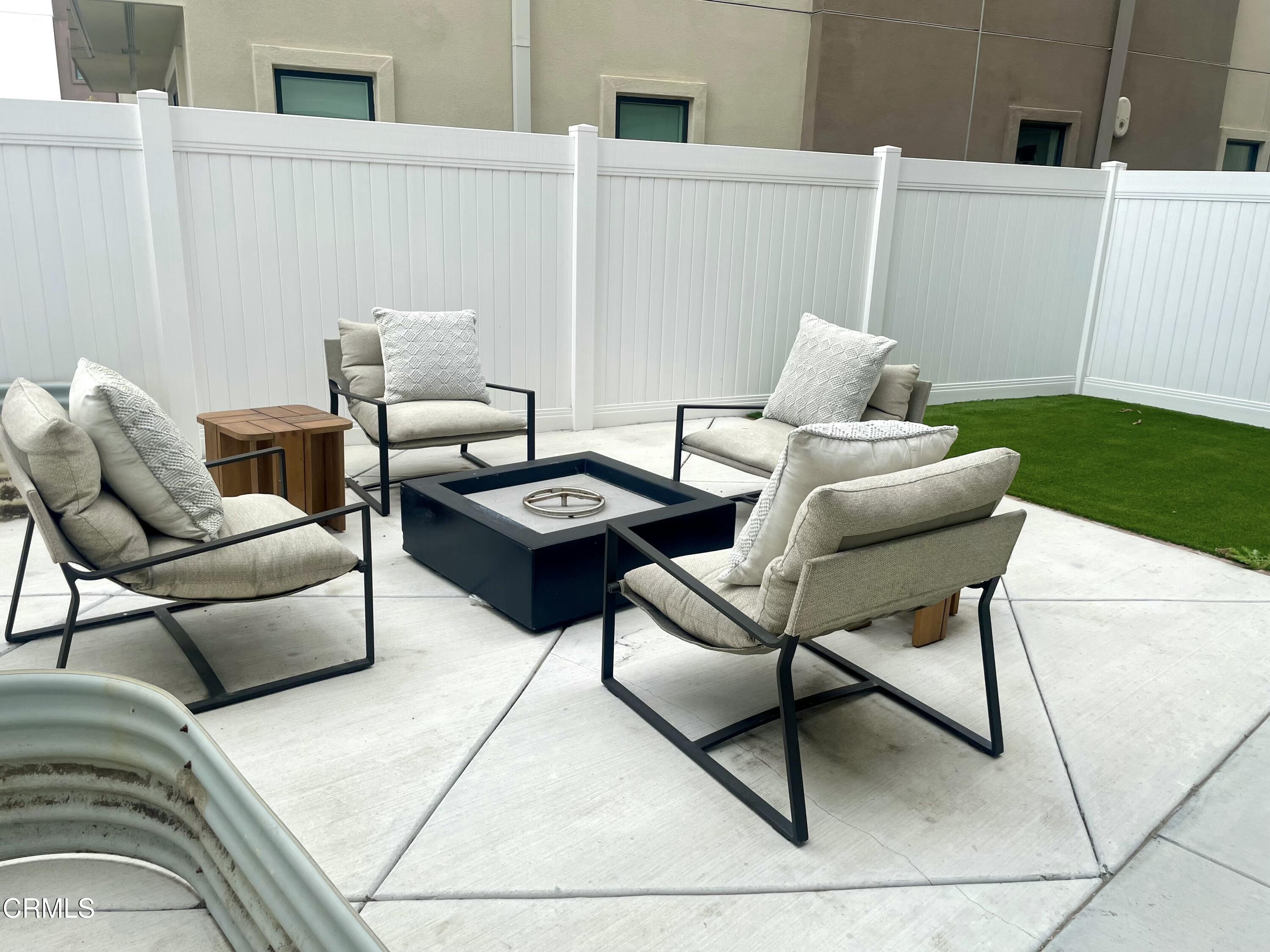 1066 Canal Street Oxnard, CA 93035 - Photo 31 of 34 a living room with furniture and garden