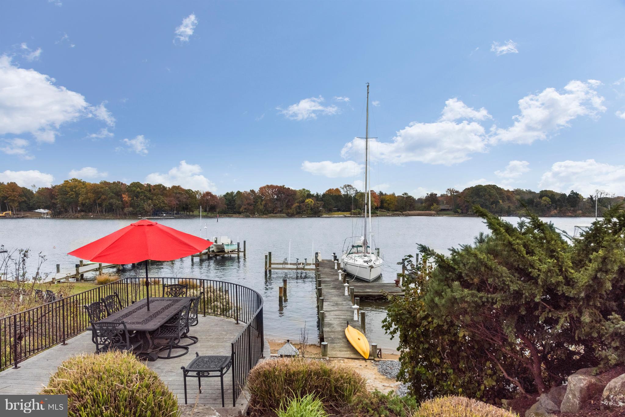 1795 Beachfield Road Annapolis, MD 21409 - Photo 3 of 49 a view of a lake with couches in patio