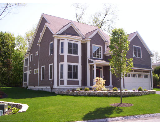 3 Martingale Road, Unit LOT #1 Lexington, MA 02421 - Photo 1 of 10 a front view of a house with a yard