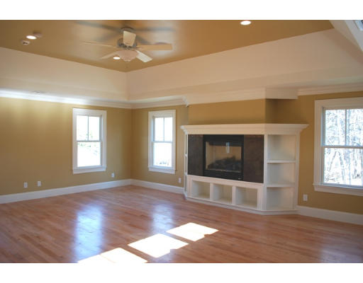 3 Martingale Road, Unit LOT #1 Lexington, MA 02421 - Photo 9 of 10 a view of an empty room with a window and wooden floor