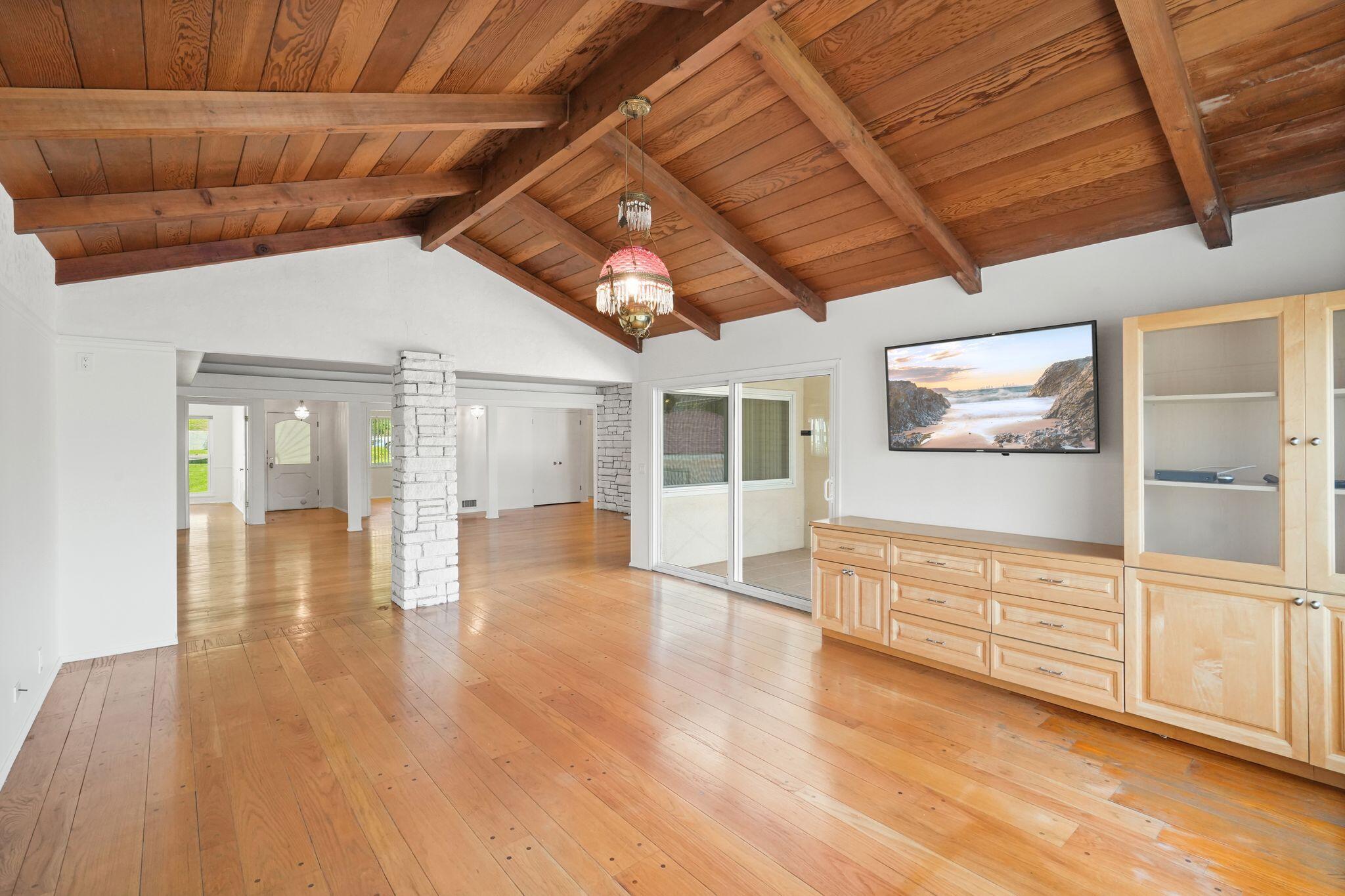 108 West Kenneth Road Glendale, CA 91202 - Photo 13 of 47 a view of an empty room with wooden floor and a window