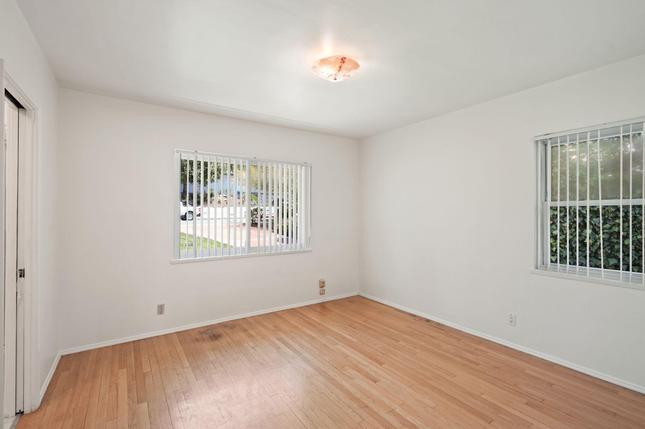 108 West Kenneth Road Glendale, CA 91202 - Photo 21 of 47 a view of an empty room with a window
