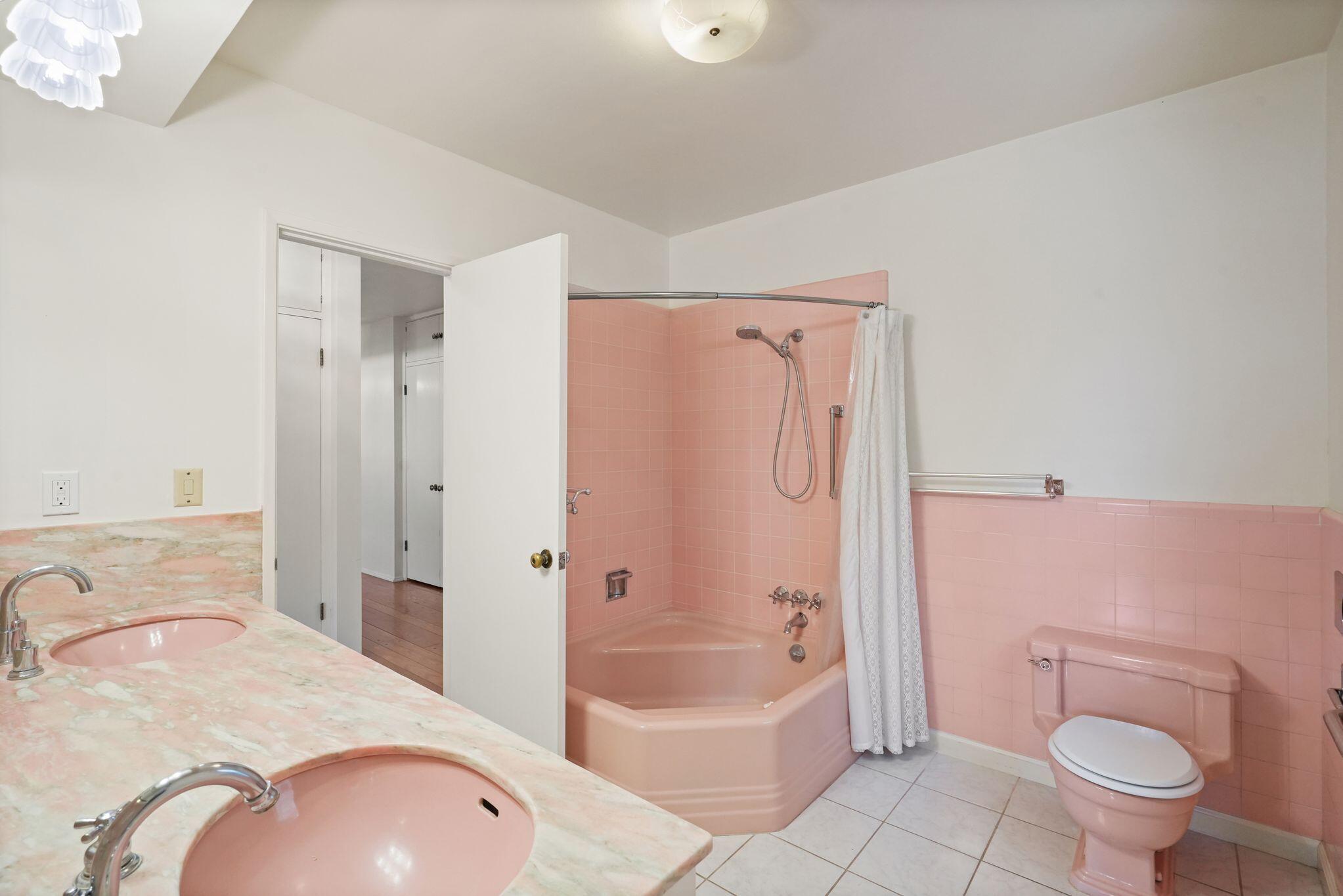 108 West Kenneth Road Glendale, CA 91202 - Photo 26 of 47 a bathroom with a sink toilet and shower