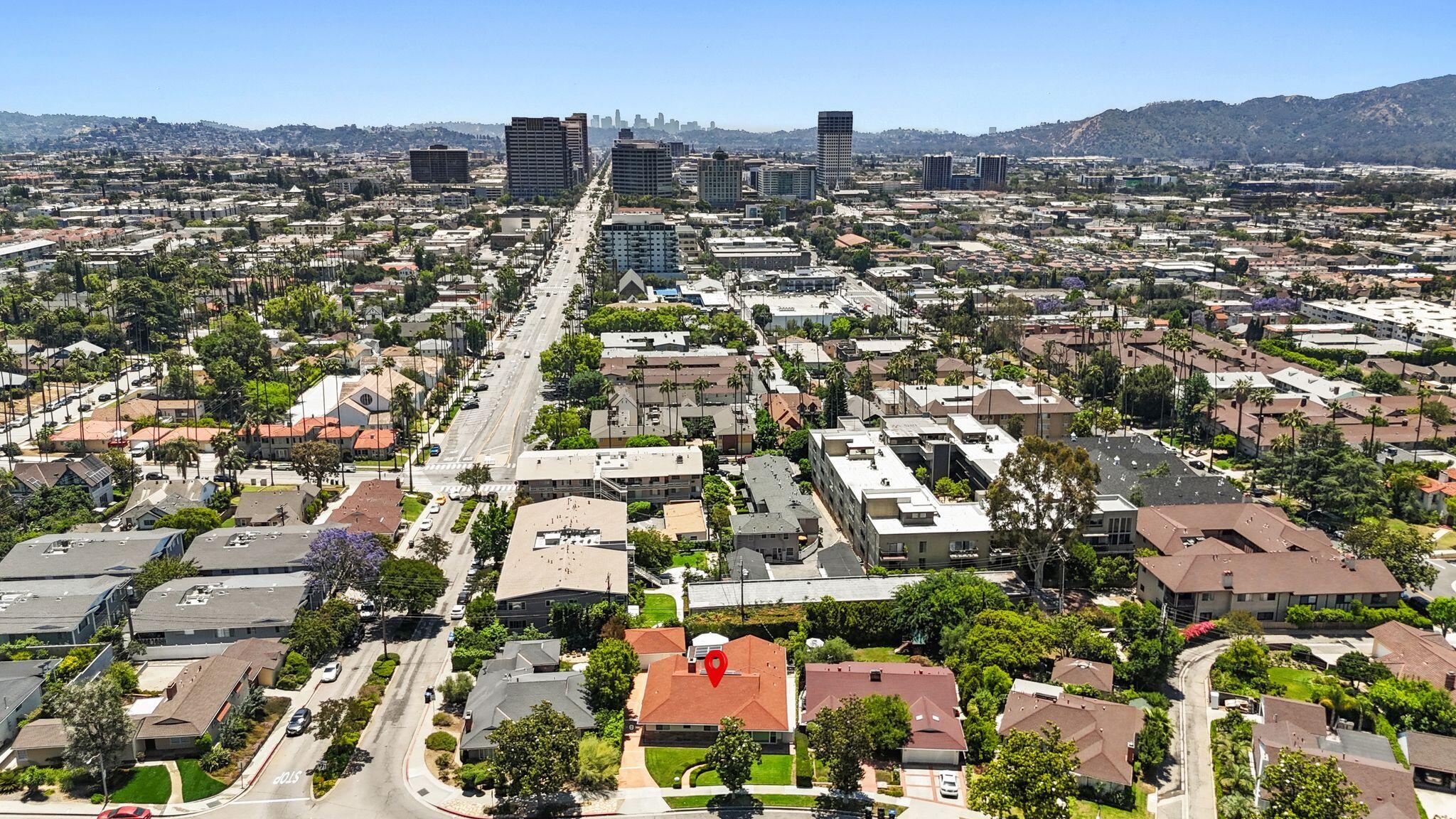 108 West Kenneth Road Glendale, CA 91202 - Photo 3 of 47 an aerial view of residential building with parking