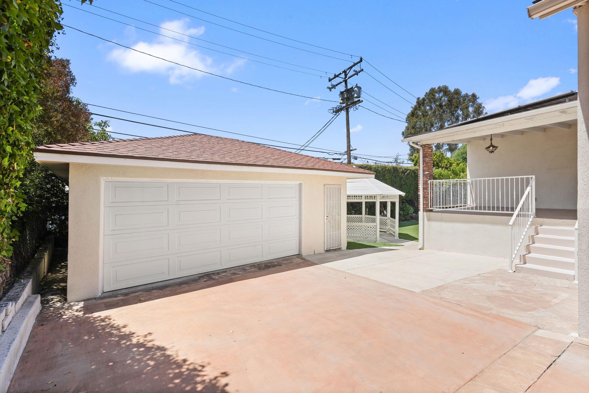 108 West Kenneth Road Glendale, CA 91202 - Photo 43 of 47 a porch with seating space and yard in back